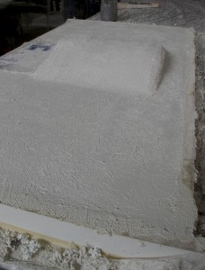 A countertop removed from the mold and curing.