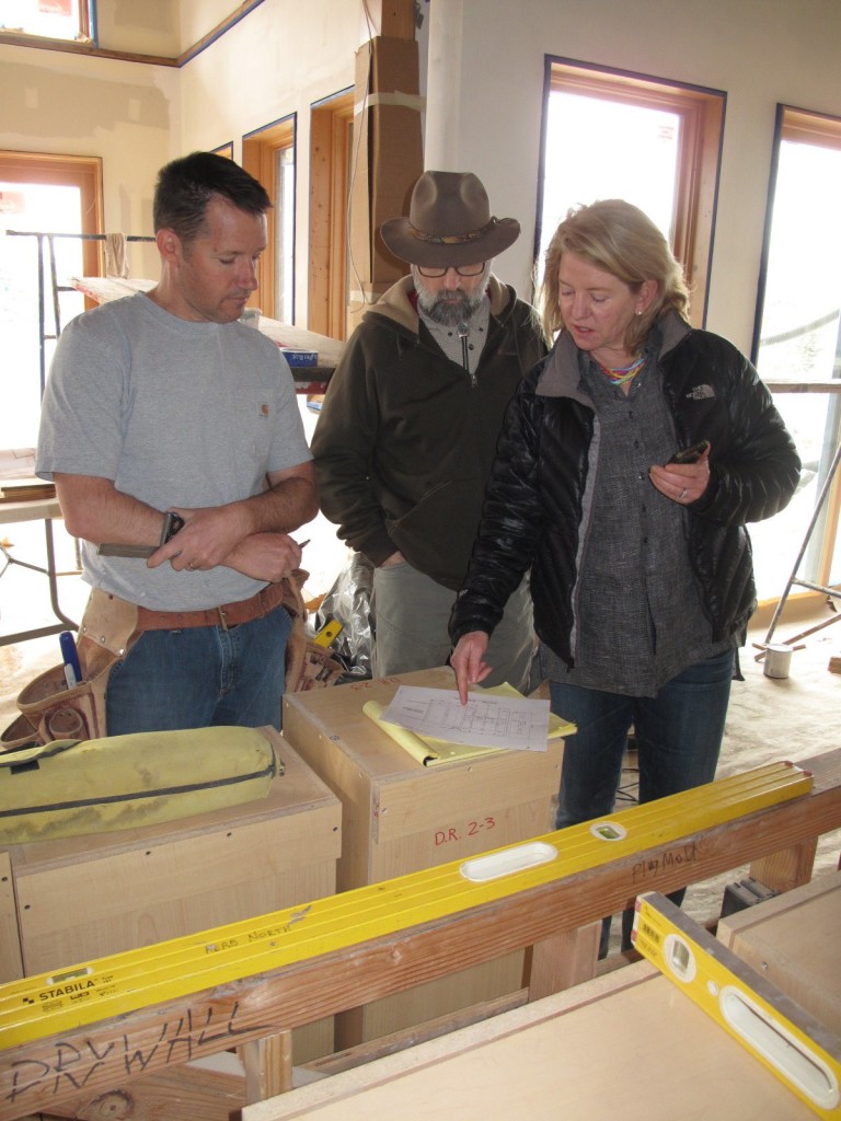 Gabriel Dansky with Dansky Handcrafted, Tom and Barb look at the cabinets.