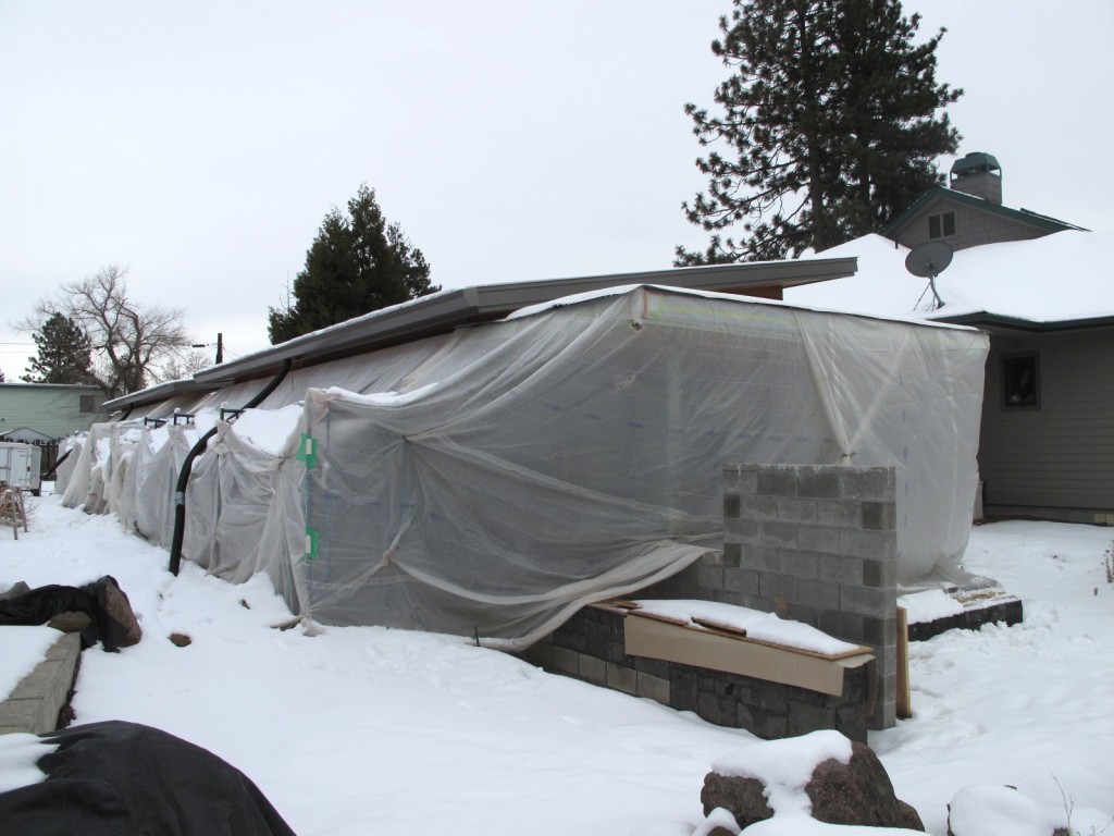The ADU was wrapped in a plastic tent way back in December, anticipating the beginning of the plastering.