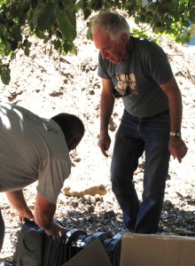 Patrick Fitzgerald, PE for Whole Water Systems and Brent with McKernan Enterprises look over the inflow pipe.