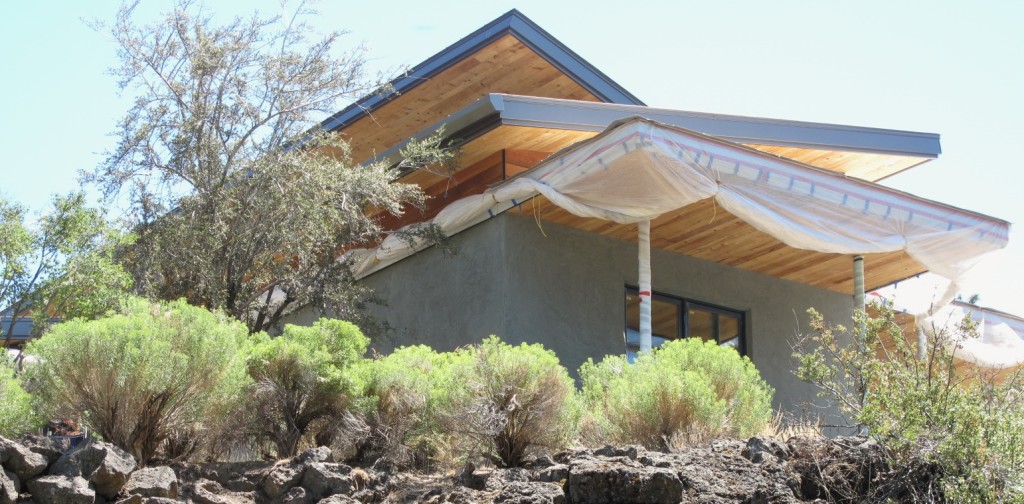 The view from Shasta Place on the west side. Soon, the plastic will be removed (reused or recycled) and the beauty of the exterior elements will be revealed.