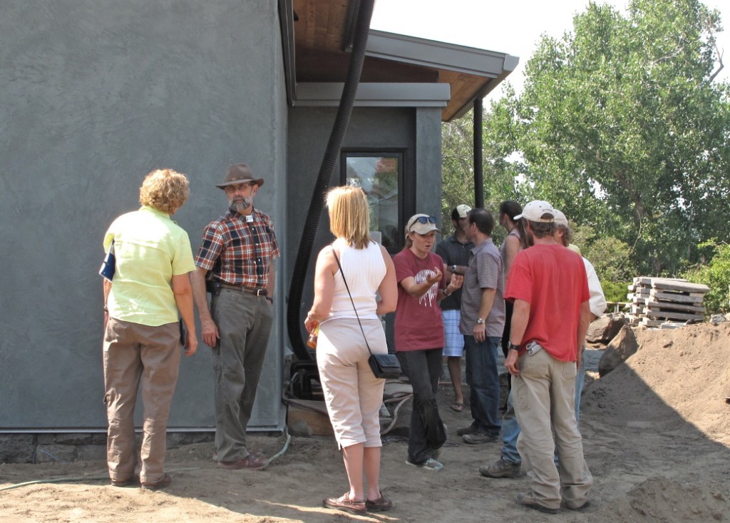 Tom explains some of the exterior elements of Desert Rain to part of the tour. Visitors included designers, builders, contractors, and homeowners from the local area and as far away as Germany.