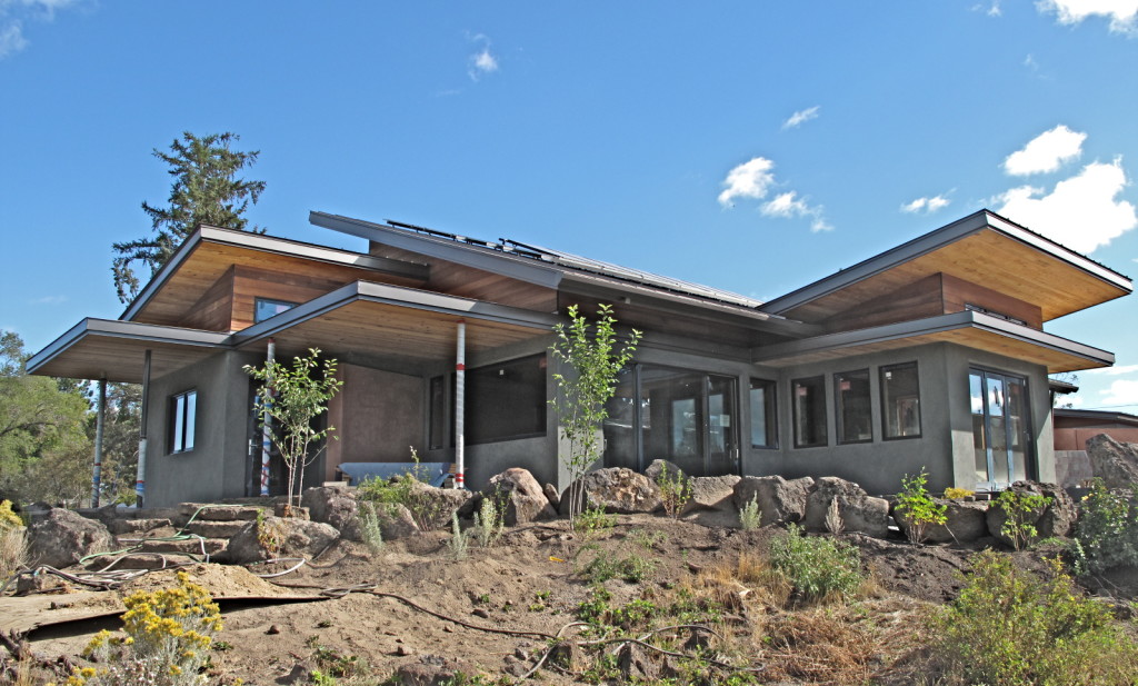 Desert Rain as viewed from the southwest with the exterior near completion - paving stones, pathways, and plants in place.