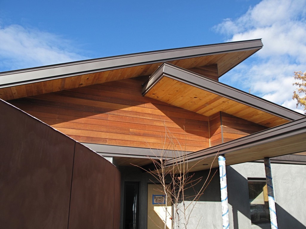 The FSC certified cedar siding glowing in sunlight.