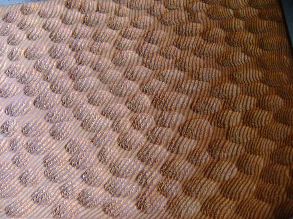 The raindrops carving representing yin - the feminine, softer side.