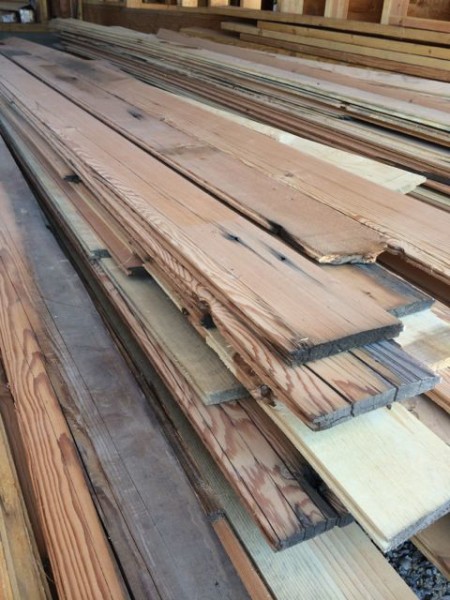 Salvaged wood waiting to be installed as soffits.